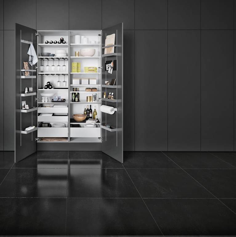 SieMatic MultiMatic interior organization system for tall cabinets offers storage space for jars, glasses, dinnerware and supplies