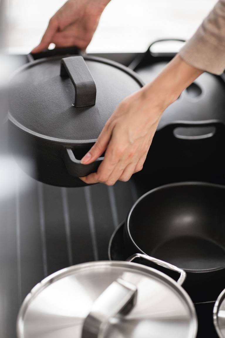 GripDeck in kitchen drawers and pull-outs prevents heavy pots and pans from sliding