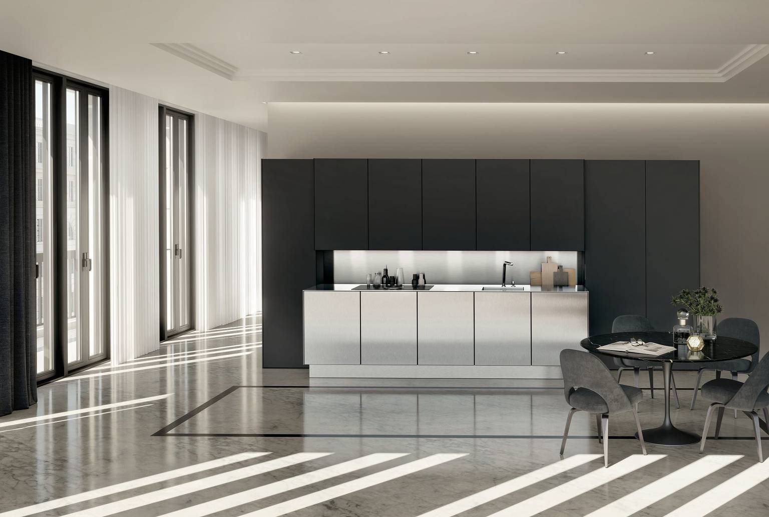 SieMatic Pure SE kitchen with tall and wall cabinets in graphite grey matte lacquer as well as base cabinets in stainless steel
