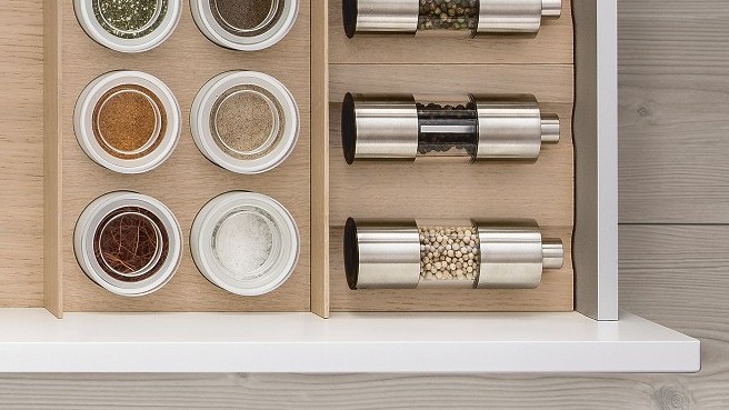 Spice jars and mills from SieMatic wooden interior accessories for the kitchen